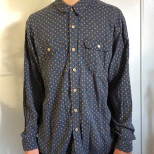 Plaid with orange fishes pattern